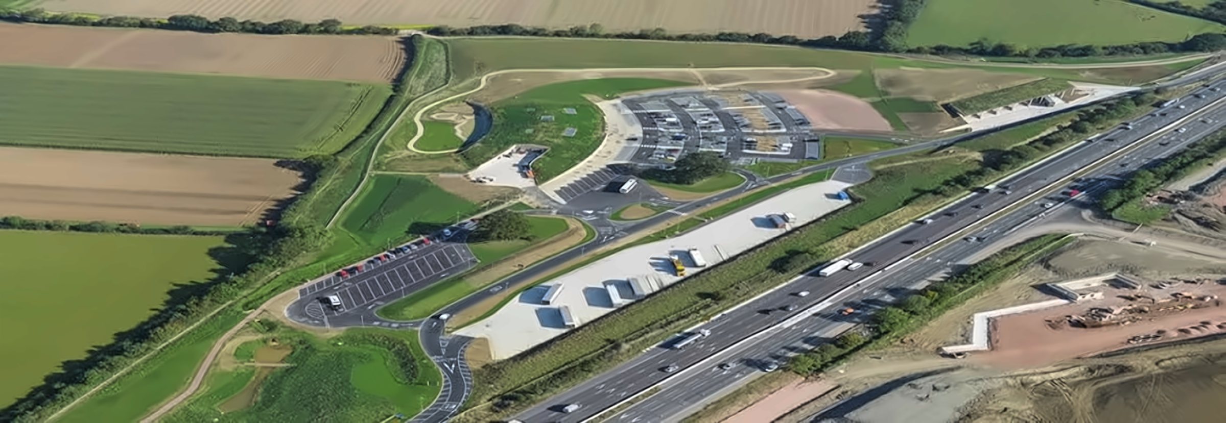 Aerial view of Gloucester Gateway Motorway Services beside the motorway